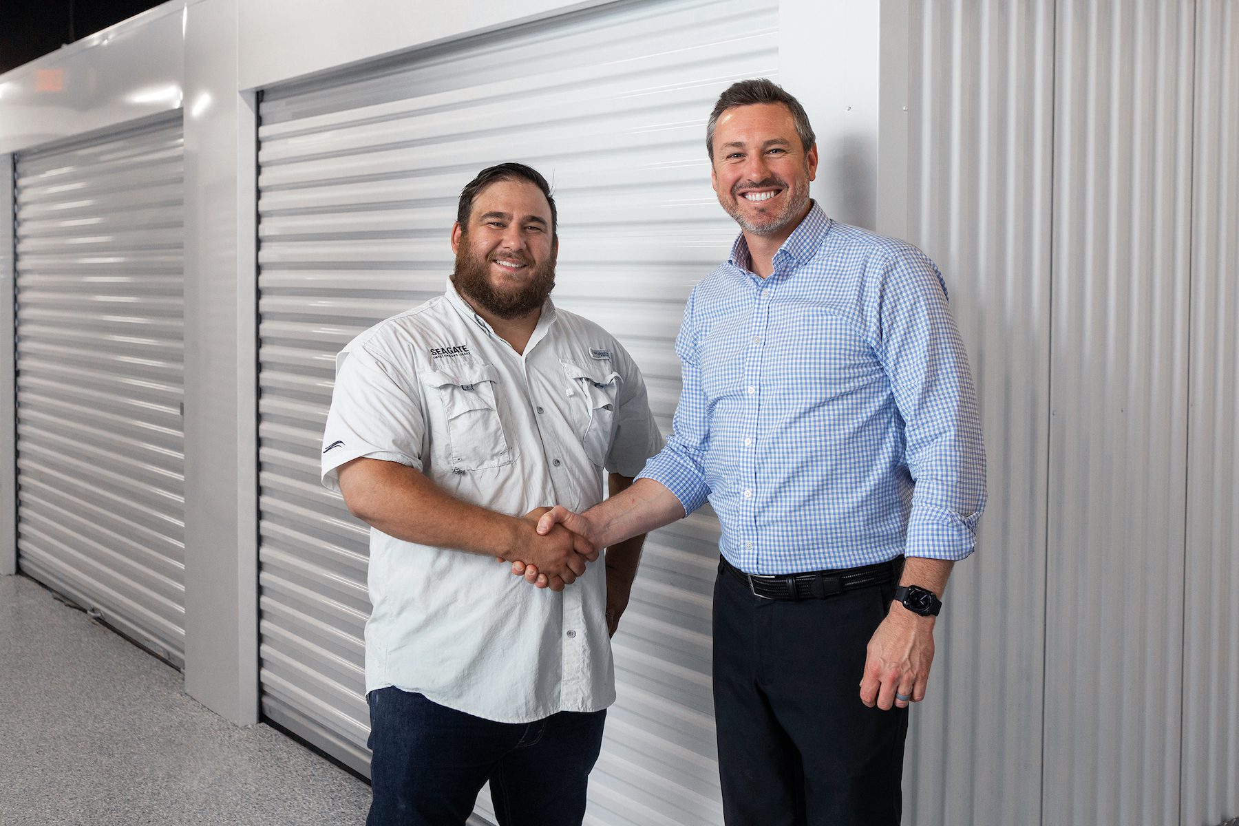 High-resolution photo attached of Chad Commers, Isles Luxury Storage owner and Alex Castro, Seagate’s Construction Manager.